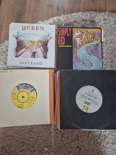 102x single vinyl records - single,